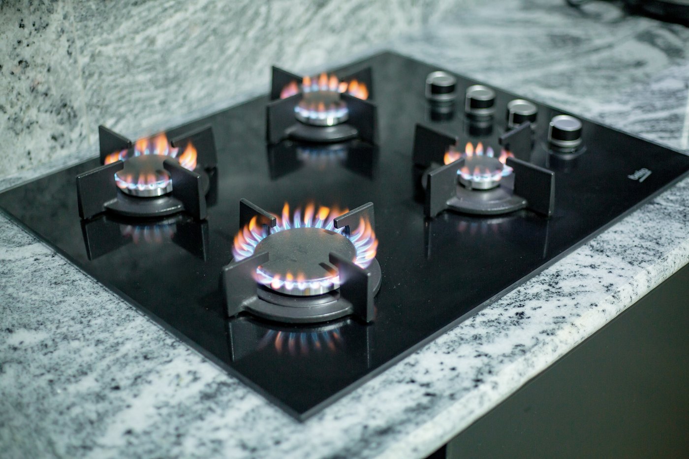 Gas hob on a granite counter