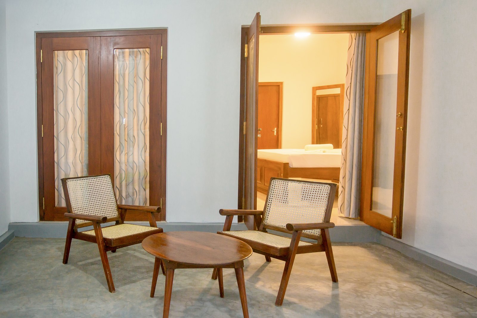 Rattan chairs on the covered verandah